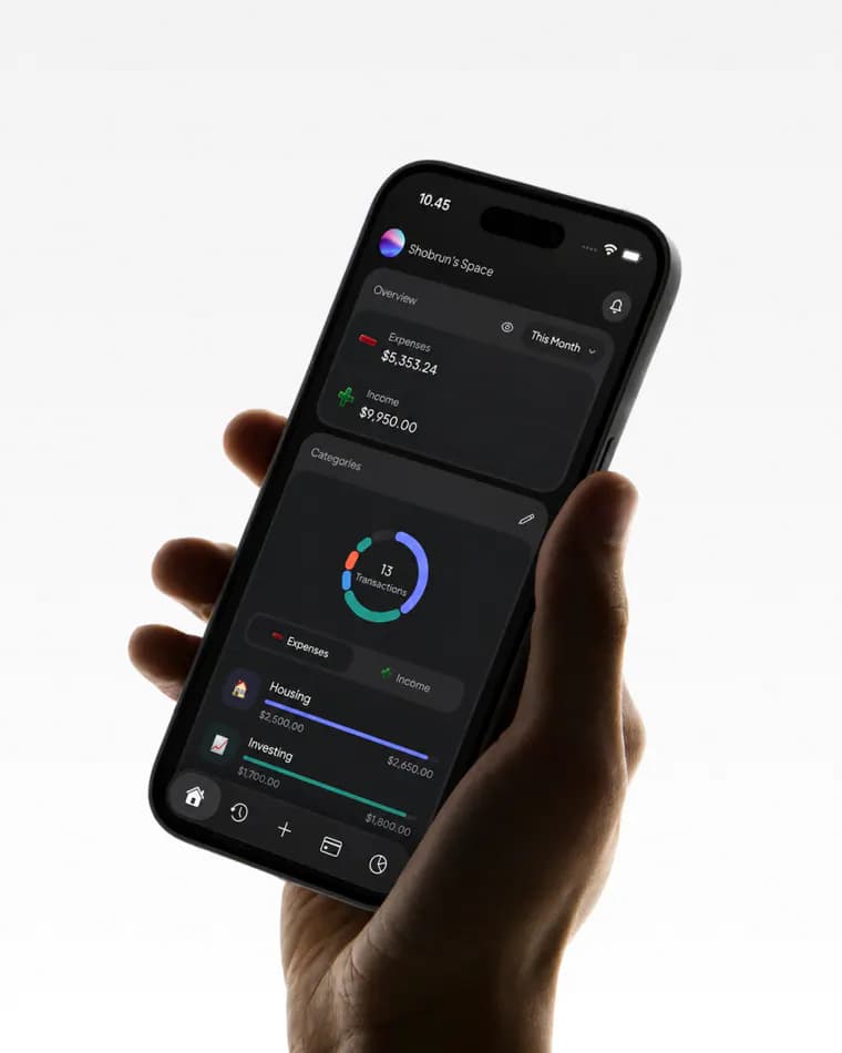 Monveo money space overview displayed on a phone held in one hand